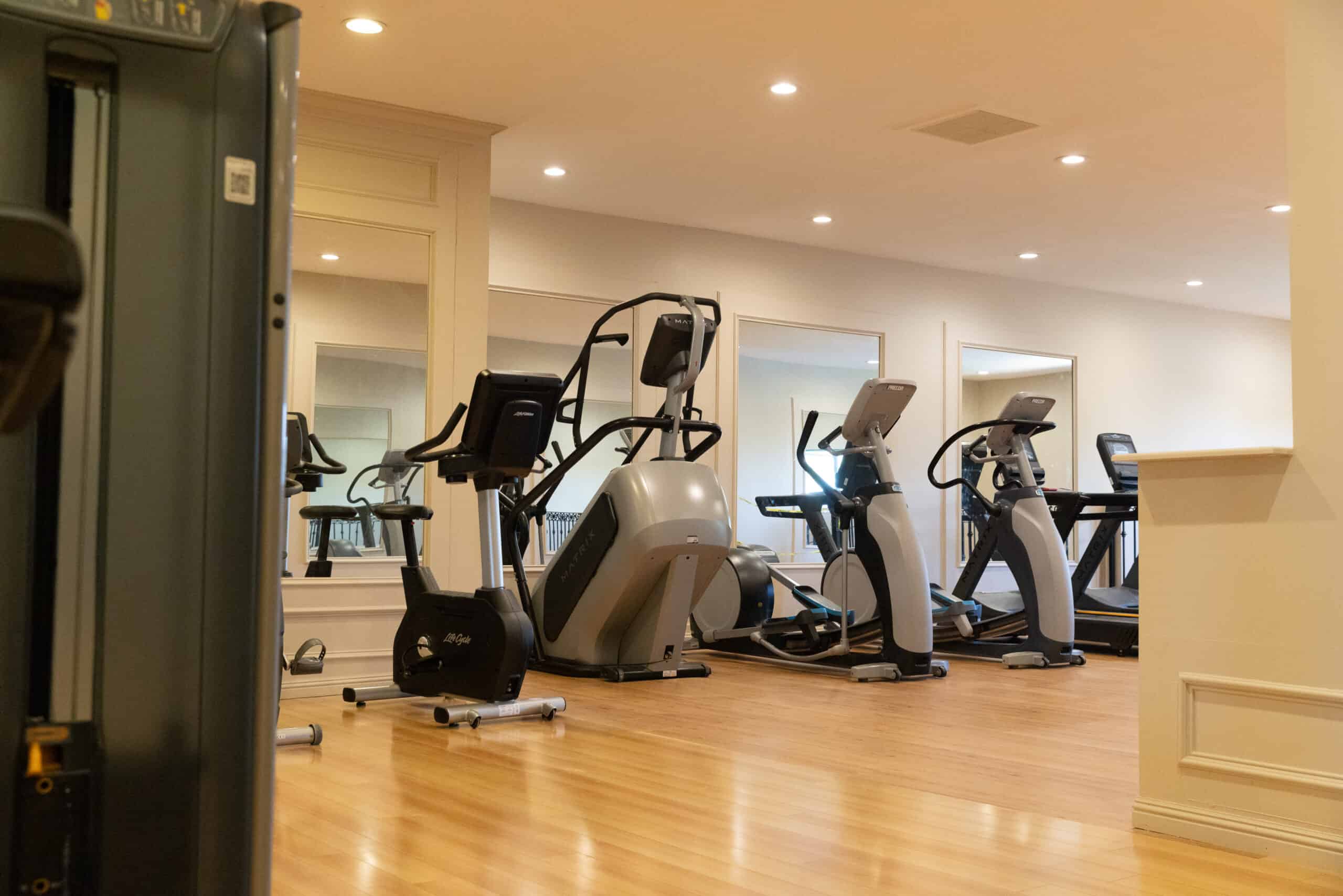 Women's Only Gym — cardio machines and elegant mirrored suite